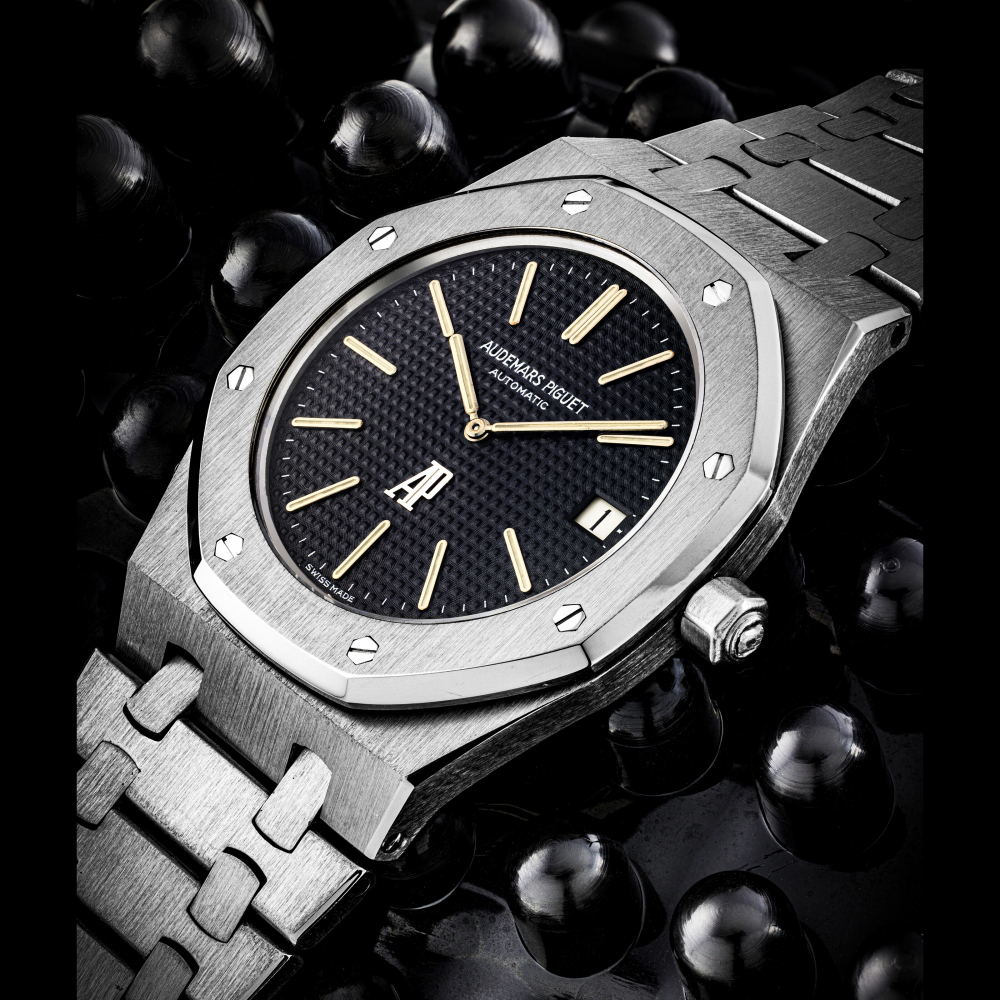 AUDEMARS PIGUET. A RARE STAINLESS STEEL AUTOMATIC WRISTWATCH WITH DATE AND BRACELET