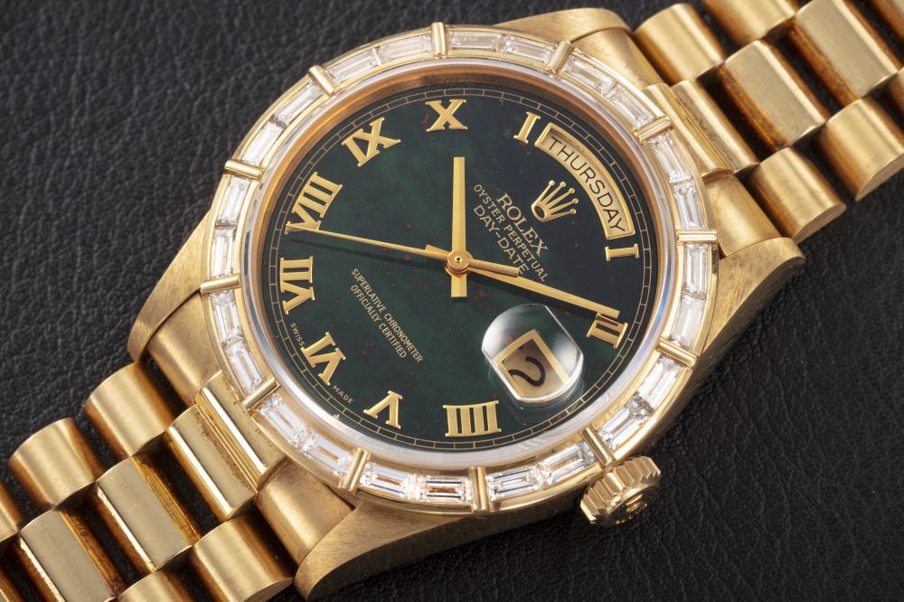 ROLEX, DAY DATE REF. 18168, A GOLD AUTOMATIC WRISTWATCH WITH BLOODSTONE DIAL - CASE