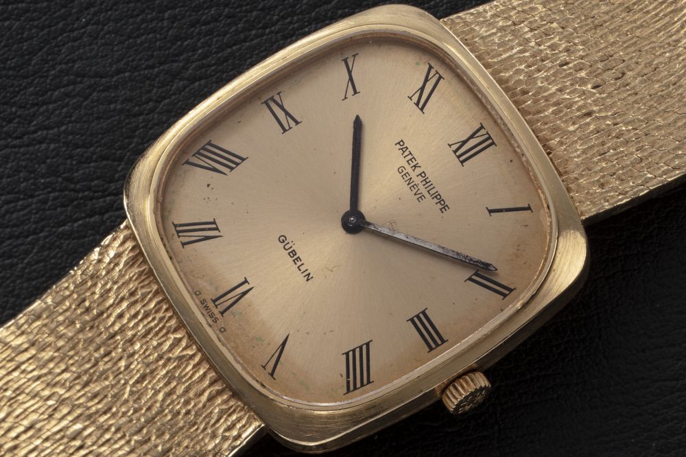 PATEK PHILIPPE, REF. 3566/1 “GUBELIN” DIAL, A GOLD CUSHION-SHAPED WRISTWATCH - CASE