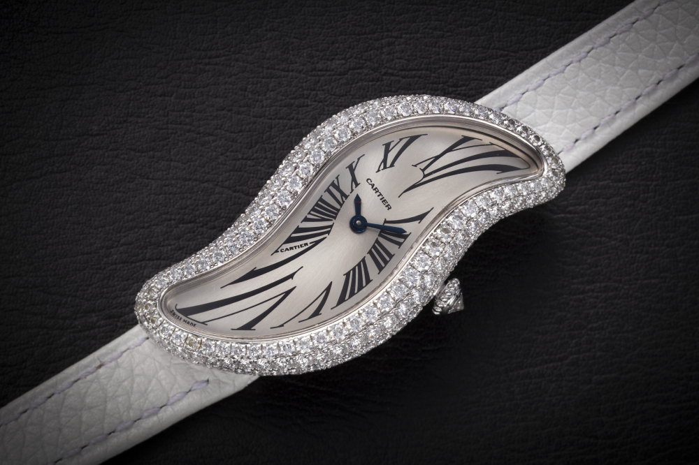 CARTIER, BAIGNOIRE S CRASH REF. 3174, AN ATTRACTIVE GOLD AND DIAMOND-SET ASYMMETRICAL WRISTWATCH - CASE