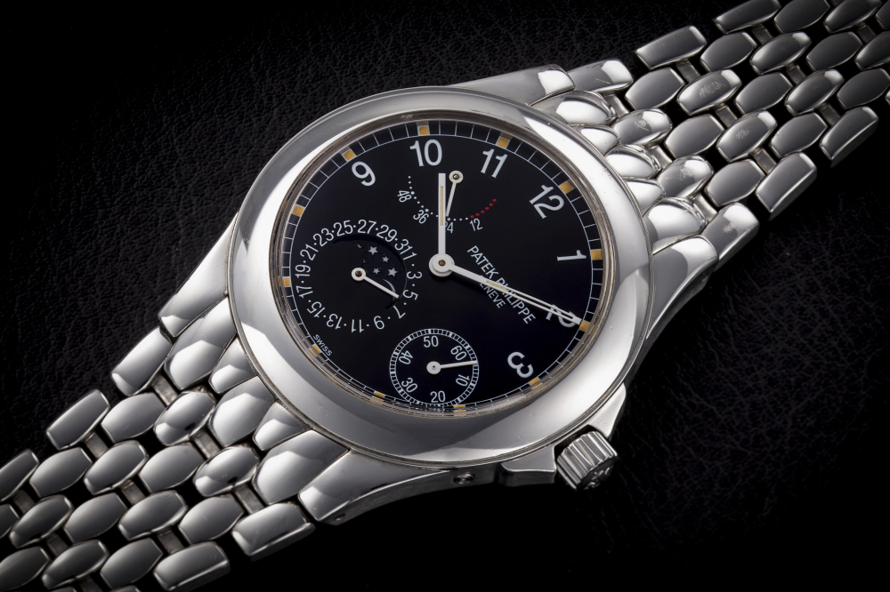 PATEK PHILIPPE, NEPTUNE REF. 5085/1A, A STEEL AUTOMATIC WRISTWATCH WITH MOON-PHASE AND POWER RESERVE - CASE