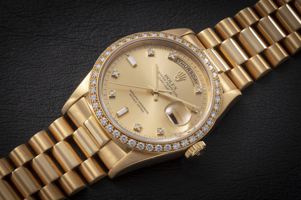 ROLEX, DAY-DATE REF. 18348, A GOLD AND DIAMOND-SET AUTOMATIC WRISTWATCH - CASE