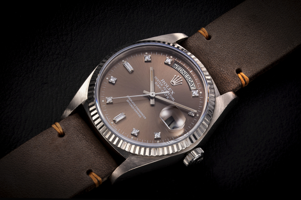 ROLEX, DAY-DATE REF. 18039, A GOLD AND DIAMOND-SET AUTOMATIC WRISTWATCH - CASE