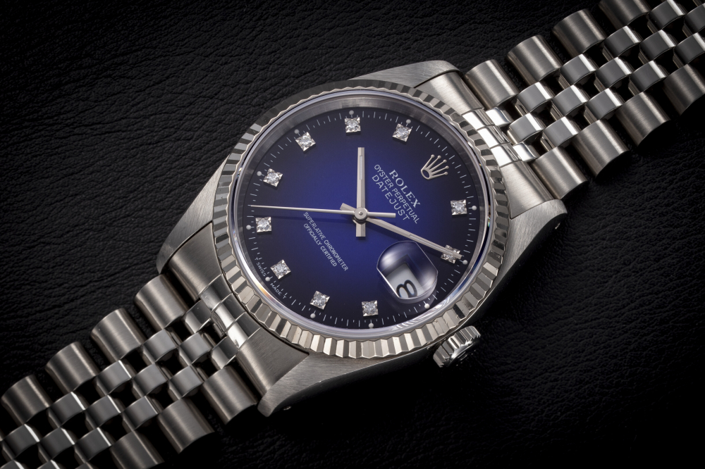 ROLEX, DATEJUST REF. 16234, A STEEL AND GOLD AUTOMATIC WRISTWATCH WITH DIAMOND-SET BLUE VIGNETTE DIAL - CASE