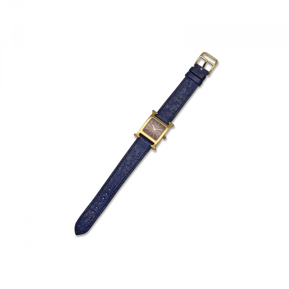 A GILT METAL HEURE H WATCH - HERMÈS