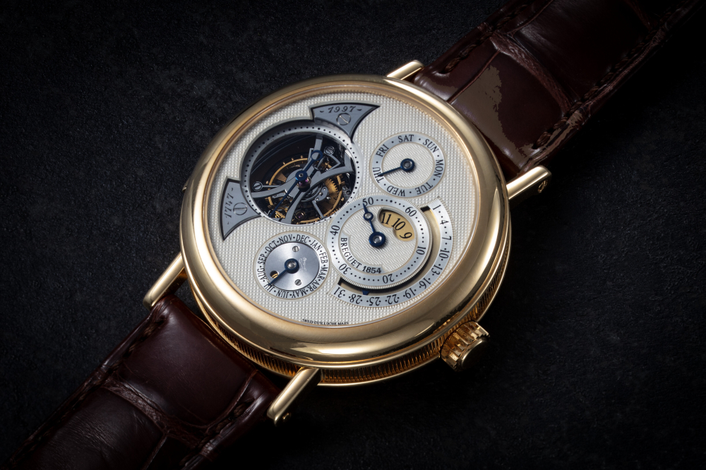 BREGUET, REF. 3857, A RARE GOLD MINUTE REPEATING PERPETUAL CALENDAR TOURBILLON WITH JUMP HOURS MADE FOR THE BRAND'S 250th ANNIVERSARY, CASE NUMBER: 1854H, MOVEMENT NUMBER: 1752 | Christie’s