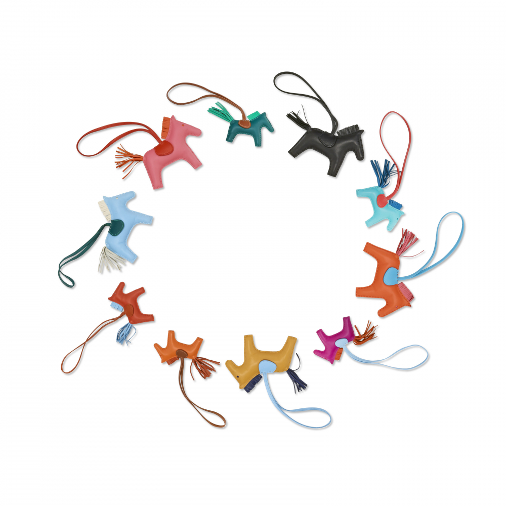 A GROUP OF TEN LEATHER "GRIGRI RODEO" CHARMS - HERMÈS