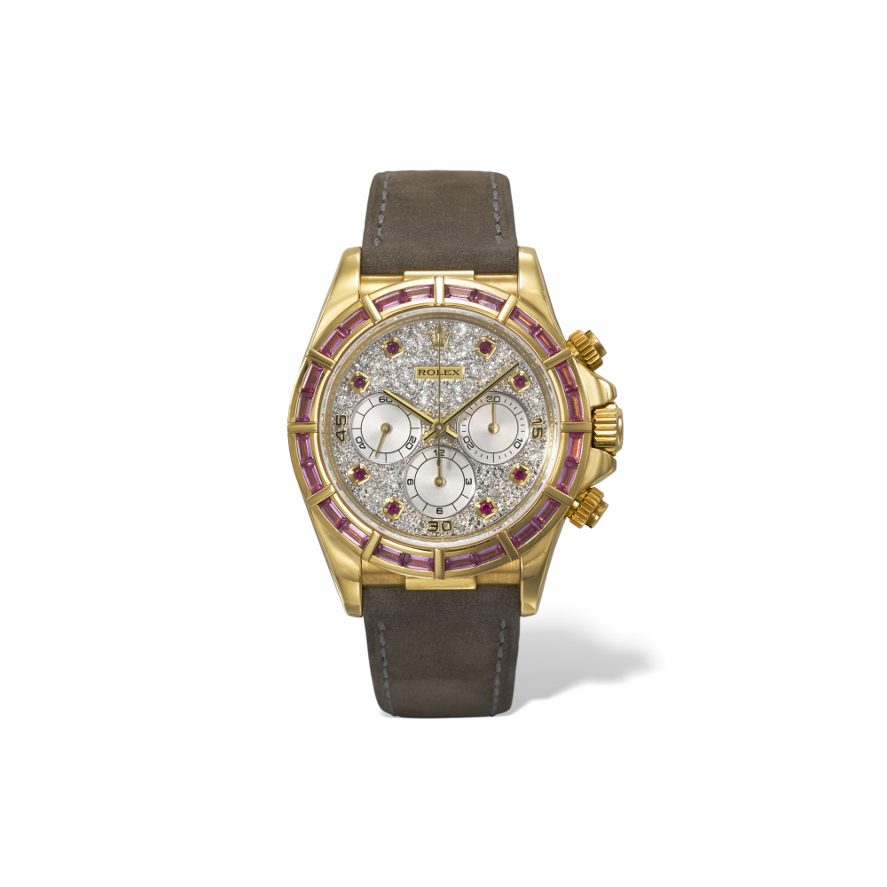 ROLEX. A VERY RARE AND EXTREMELY ATTRACTIVE 18K GOLD, DIAMOND AND PINK SAPPHIRE-SET AUTOMATIC CHRONOGRAPH WRISTWATCH WITH BAGUETTE-CUT PINK SAPPHIRE BEZEL