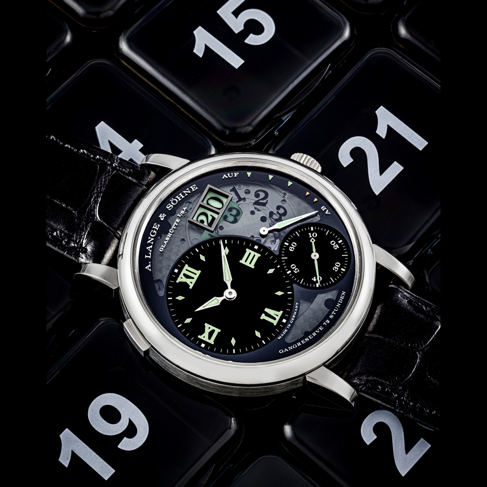 A. LANGE & SÖHNE. A RARE PLATINUM LIMITED EDITION SEMI-SKELETONISED WRISTWATCH WITH LARGE DATE AND POWER RESERVE