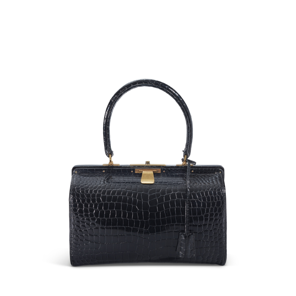 A SHINY BLACK POROSUS CROCODILE SQUARE MOUTH WITH GOLD HARDWARE