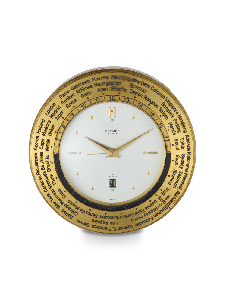 HERMES, A RARE GILT BRASS MANUAL-WINDING WORLDTIME DESK CLOCK