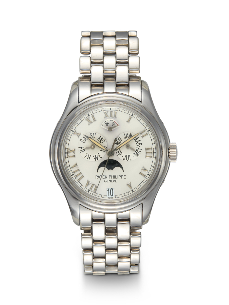 PATEK PHILIPPE, REF. 5036/1G-017, A FINE GOLD AUTOMATIC ANNUAL CALENDAR WRISTWATCH WITH BRACELET