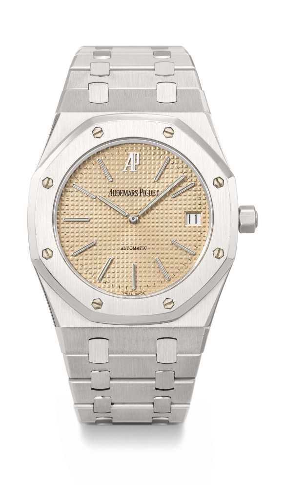 AUDEMARS PIGUET. A RARE AND HIGHLY ATTRACTIVE STAINLESS STEEL AUTOMATIC WRISTWATCH WITH DATE, PINK DIAL AND BRACELET, MADE TO COMMEMORATE THE 20TH ANNIVERSARY OF THE ROYAL OAK