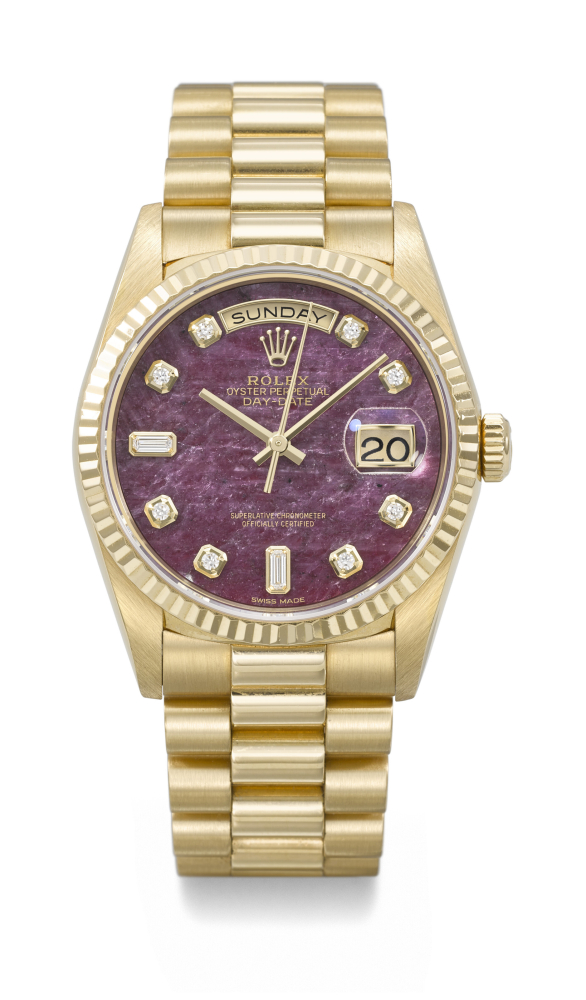 ROLEX. A RARE AND ATTRACTIVE 18K GOLD AND DIAMOND-SET AUTOMATIC WRISTWATCH WITH SWEEP CENTRE SECONDS, DAY, DATE, GROSSULAR GARNET RUBELLITE DIAL AND BRACELET