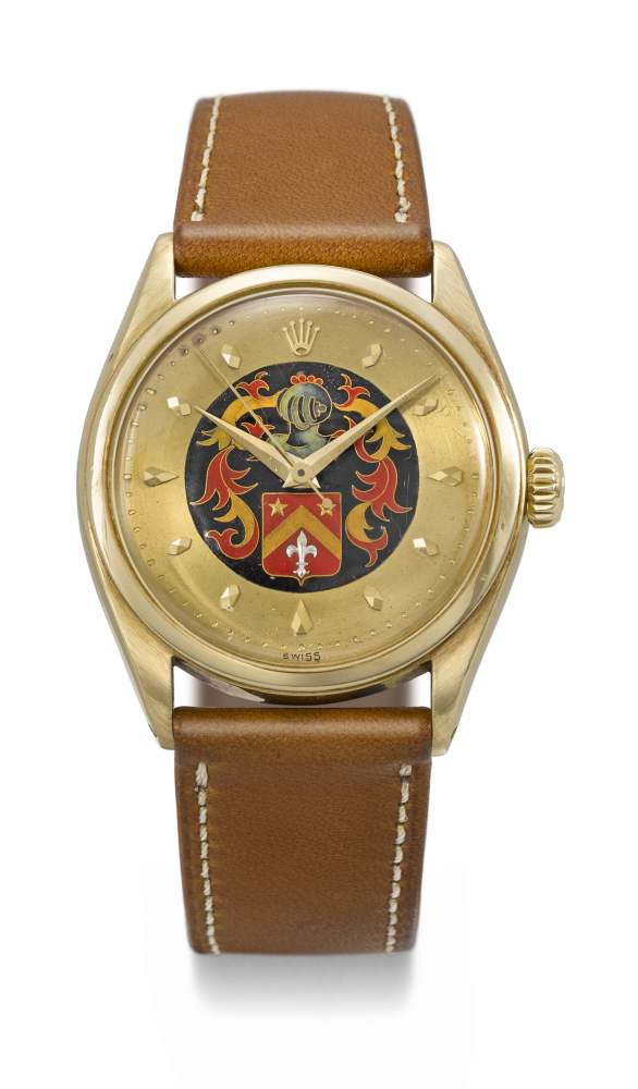 ROLEX. AN EXCEPTIONAL AND PROBABLY UNIQUE 18K GOLD AUTOMATIC WRISTWATCH WITH SWEEP CENTRE SECONDS AND HERALDIC ARMORIAL CLOISONNÉ ENAMEL DIAL BY MARGUERITE KOCH