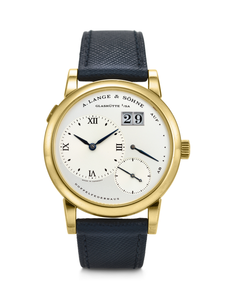 A. LANGE & SÖHNE. AN EARLY AND DESIRABLE 18K GOLD WRISTWATCH WITH OUTSIZED DATE AND POWER RESERVE INDICATION