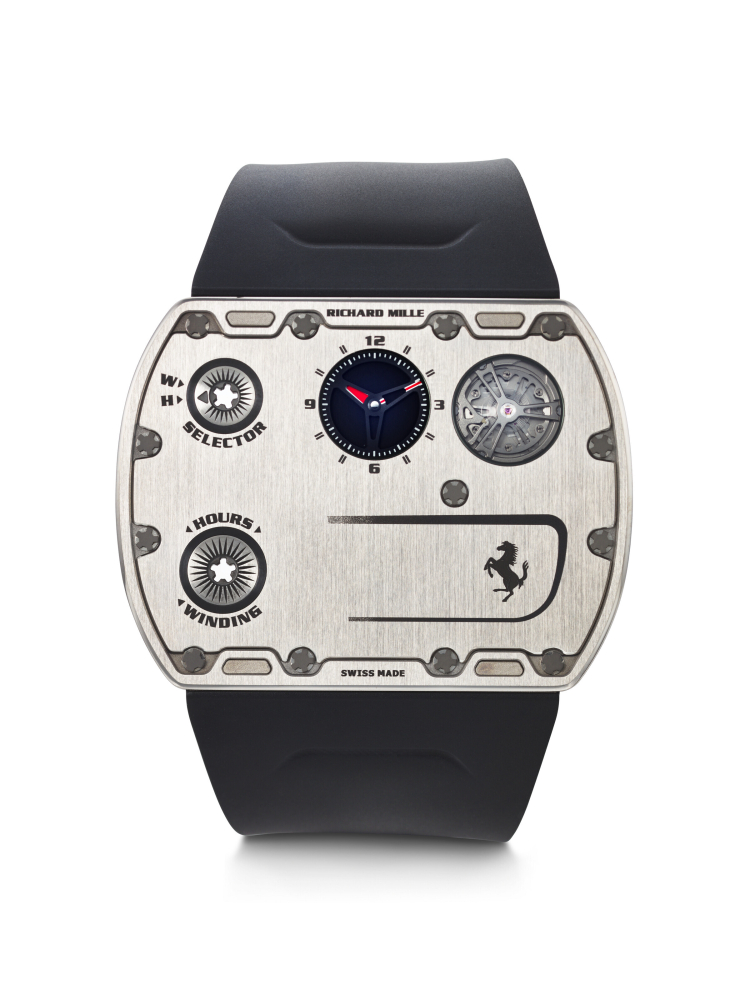 RICHARD MILLE, IN PARTNERSHIP WITH FERRARI. AN EXCEPTIONAL AND CONCEPTUAL ULTRA-FLAT TITANIUM LIMITED EDITION WRISTWATCH WITH FUNCTION SELECTOR AND VISIBLE TITANIUM BALANCE