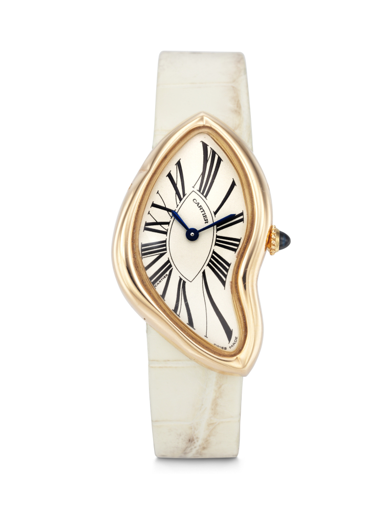 CARTIER. AN EXTREMELY RARE AND UNUSUAL 18K PINK GOLD ASYMMETRICAL WRISTWATCH WITH 'CRASH' DEPLOYANT CLASP