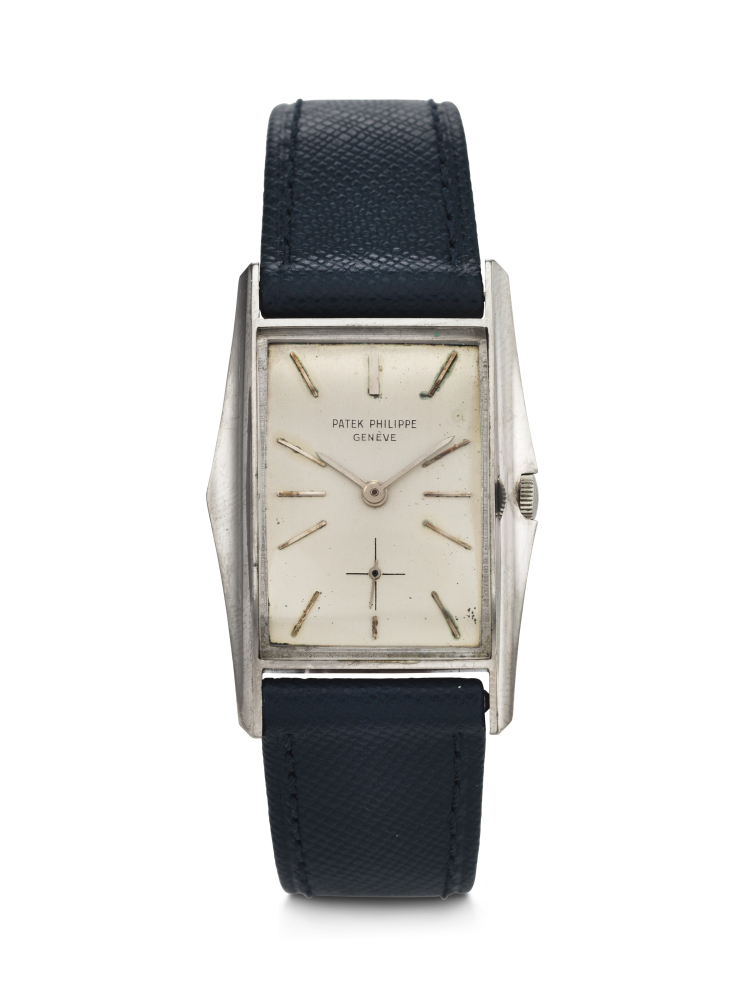 PATEK PHILIPPE, DESIGNED BY GILBERT ALBERT, EXTREMELY RARE AND HIGHLY ATTRACTIVE WHITE GOLD 'MANTA RAY', REF. 2554