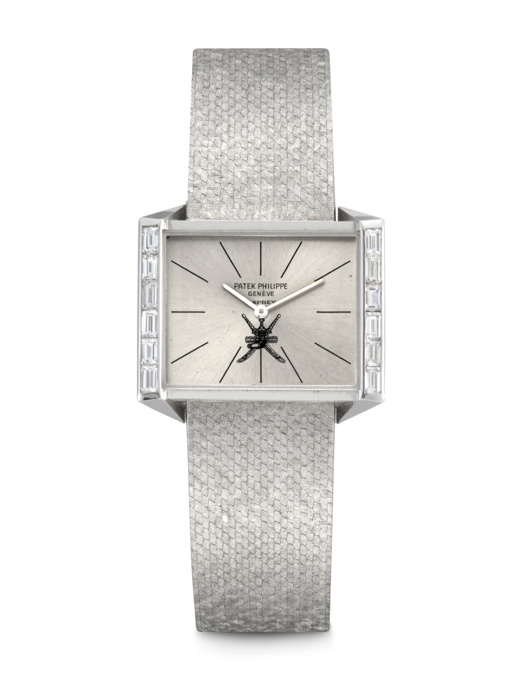 PATEK PHILIPPE, MADE FOR THE SULTANATE OF OMAN AND RETAILED BY ASPREY, EXTREMELY RARE WHITE GOLD AND BAGUETTE DIAMOND-SET RECTANGULAR WRISTWATCH WITH KHANJAR DIAL, REF. 3506/2