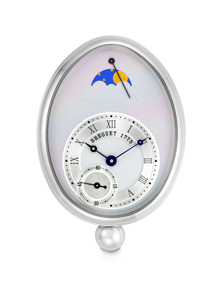 BREGUET. A WHITE METAL WALL CLOCK