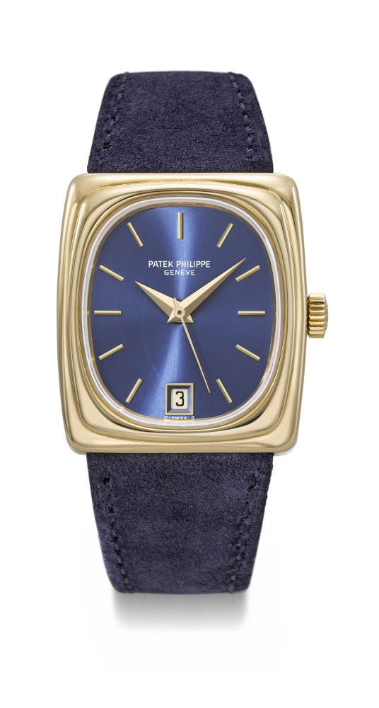 PATEK PHILIPPE. A RARE 18K GOLD QUARTZ WRISTWATCH WITH SWEEP CENTRE SECONDS AND DATE