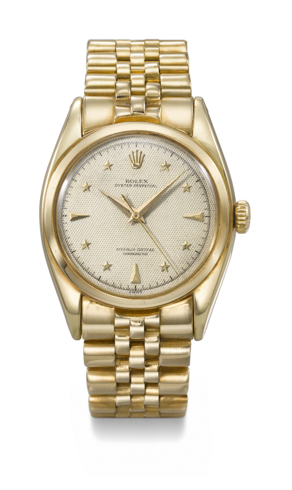 ROLEX. AN EXCEEDINGLY RARE AND HIGHLY ATTRACTIVE 18K GOLD AUTOMATIC WRISTWATCH WITH SWEEP CENTRE SECONDS, LUMINOUS HONEYCOMB STAR DIAL AND BRACELET