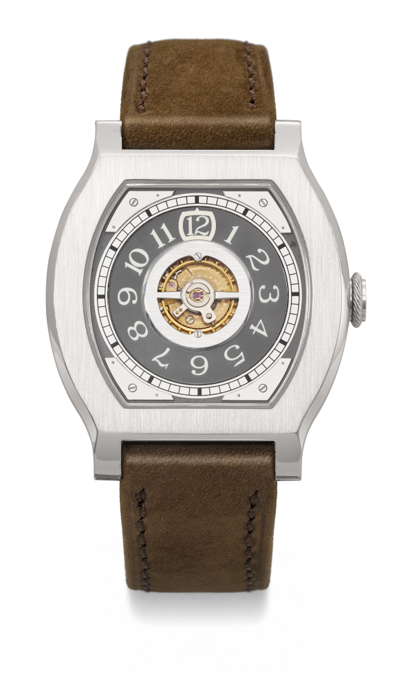 F.P. JOURNE. A VERY RARE AND ELEGANT PLATINUM LIMITED EDITION TONNEAU-SHAPED WANDERING HOURS WRISTWATCH