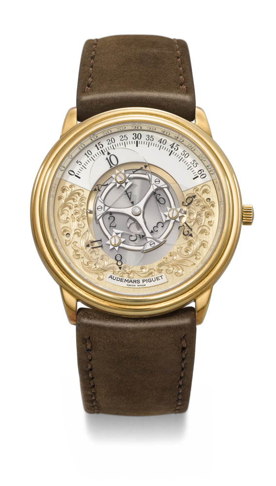 AUDEMARS PIGUET. AN ATTRACTIVE AND UNUSUAL 18K GOLD AUTOMATIC WANDERING HOUR WRISTWATCH