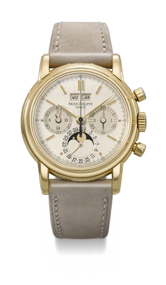 PATEK PHILIPPE. AN EXTREMELY RARE AND HIGHLY ATTRACTIVE 18K GOLD PERPETUAL CALENDAR CHRONOGRAPH WRISTWATCH WITH MOON PHASES, 24 HOUR INDICATION, LEAP YEAR INDICATION AND TWO-TONE DIAL