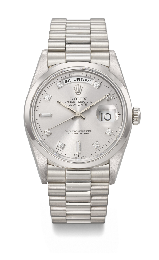 ROLEX. A RARE AND HEAVY PLATINUM AND DIAMOND-SET AUTOMATIC WRISTWATCH WITH SWEEP CENTRE SECONDS, DAY, DATE AND BRACELET