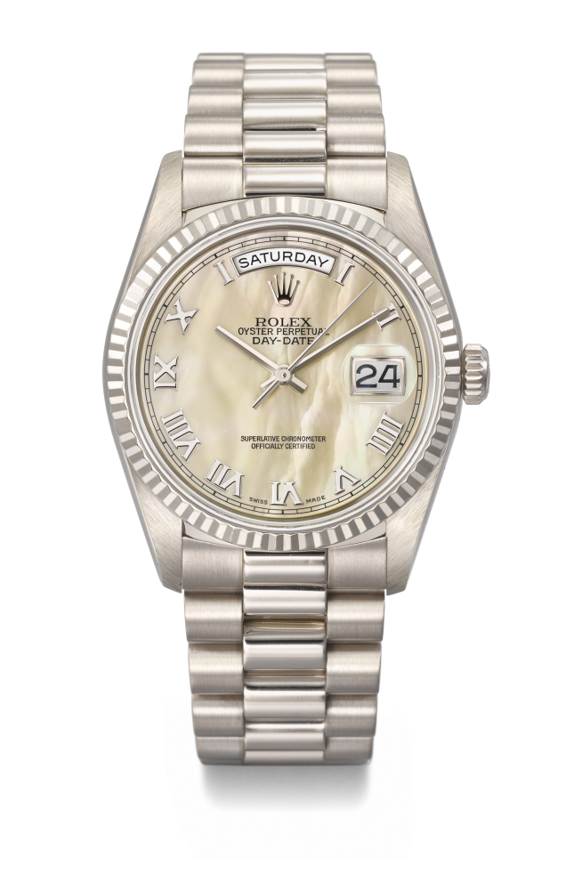 ROLEX. A HIGHLY ATTRACTIVE 18K WHITE GOLD AUTOMATIC WRISTWATCH WITH SWEEP CENTRE SECONDS, DAY, DATE, MOTHER-OF-PEARL DIAL AND BRACELET
