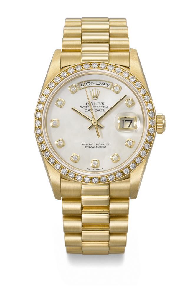 ROLEX. A RARE AND ATTRACTIVE 18K GOLD AND DIAMOND-SET AUTOMATIC WRISTWATCH WITH SWEEP CENTRE SECONDS, DAY, DATE, MOTHER-OF PEARL DIAL AND BRACELET