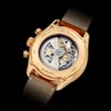 ZENITH. AN 18K PINK GOLD AUTOMATIC SEMI-SKELETONISED CHRONOGRAPH WRISTWATCH WITH DATE AND MOON PHASES