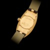 CARTIER. AN 18K PINK GOLD ELONGATED OVAL WRISTWATCH