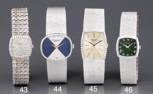 Patek Philippe. An 18K white gold oval-shaped watch with two-tone dial and bracelet