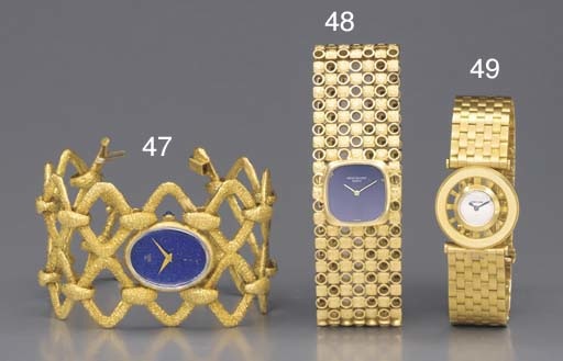 Patek Philippe. A fine lady's 18K gold bracelet watch with blue dial