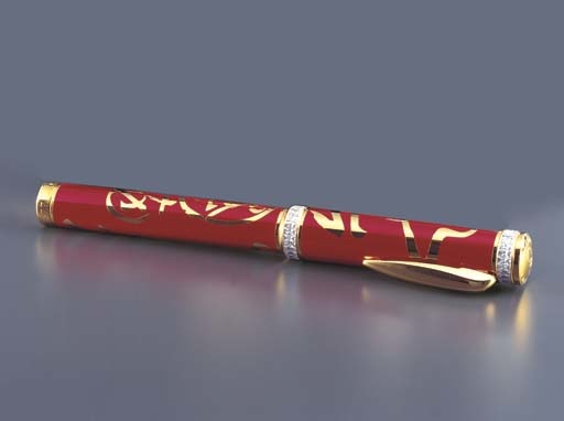 CARAN D'ACHE. A LIMITED EDITION GOLD-PLATED AND LACQUER FOUNTAIN PEN