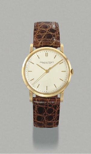 IWC. An 18K gold wristwatch with sweep centre seconds