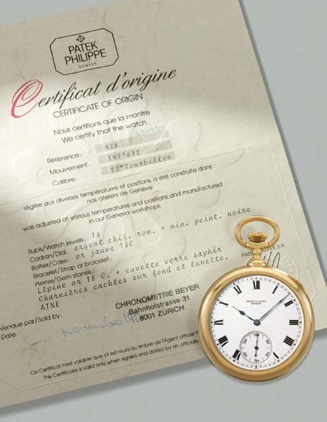 Patek Philippe. A very large, heavy and important 18K gold openface keyless lever deck watch with one minute tourbillon, original certificate and Bulletin d'Observatoire