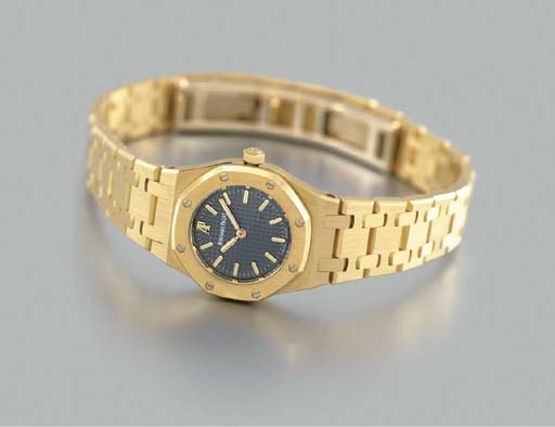 Audemars Piguet. A lady's small 18K gold wristwatch with bracelet