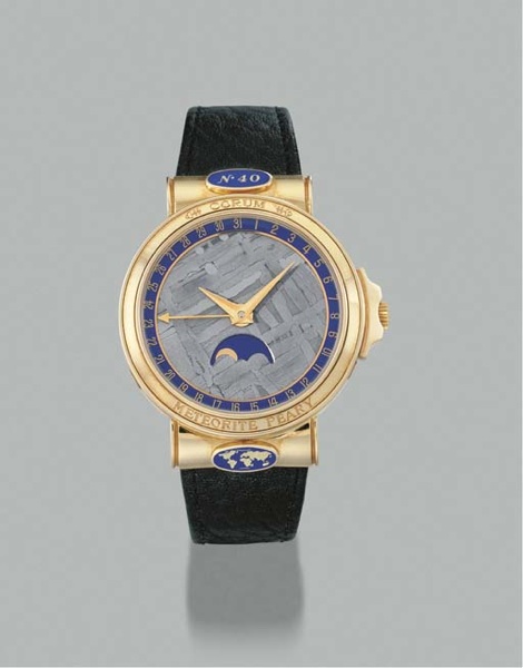 Corum. An 18K gold self-winding wristwatch with date, phases of the moon and meteorite dial