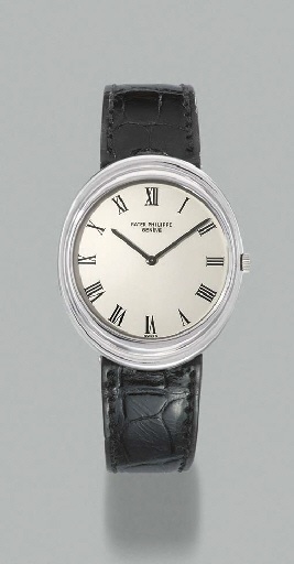 Patek Philippe. An 18K white gold oval self-winding wristwatch