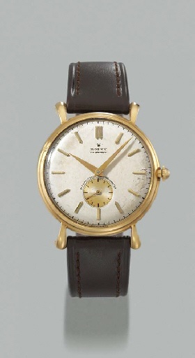 Rolex. An 18K gold self-winding wristwatch