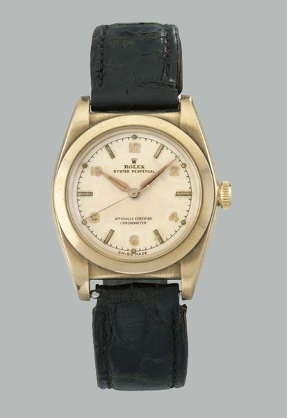 Rolex. A stainless steel and gold self-winding waterproof bubble back wristwatch with sweep centre seconds