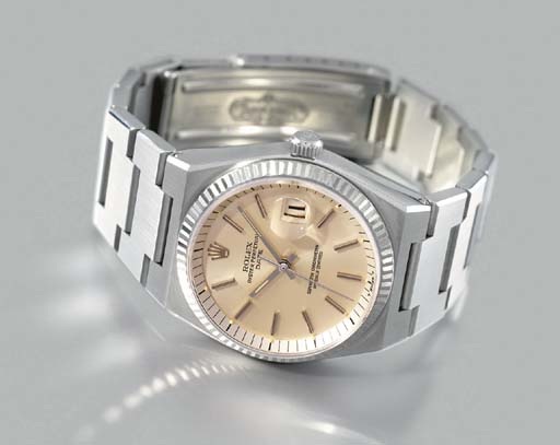 Rolex. A rare and unusual stainless steel waterproof self-winding wristwatch with sweep centre seconds, date, bracelet and 18K white gold bezel