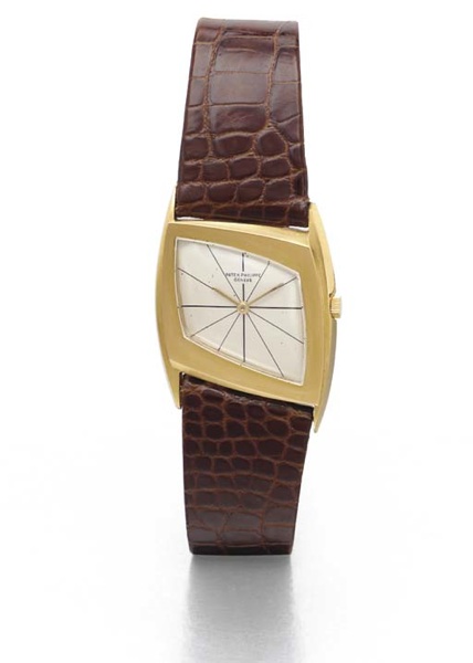 Patek Philippe. A fine and extremely rare 18K gold assymetrical wristwatch
