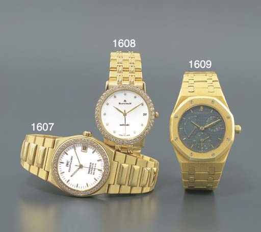 AUDEMARS PIGUET. AN 18K GOLD SELF-WINDING DUAL TIME WRISTWATCH WITH POWER RESERVE, DATE AND BRACELET