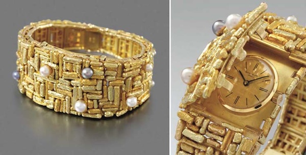 Patek Philippe. An extremely fine and probably unique 18K vari-colour gold and pearl-set bracelet watch with concealed dial, designed by Gilbert Albert