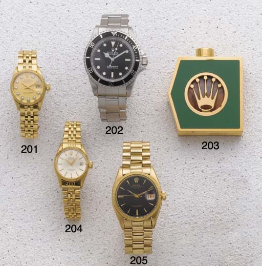 Rolex: An 18ct Gold Centre Seconds Automatic Calendar Bracelet Watch